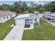 Charming single-story home featuring an attached garage, a well-manicured lawn, and lovely curb appeal at 4802 18Th St, Zephyrhills, FL 33542