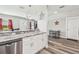 A kitchen features granite countertops, stainless steel appliances, breakfast bar and open sightlines at 4802 18Th St, Zephyrhills, FL 33542