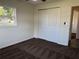 Bedroom with a closet, featuring carpeting, and neutral-colored walls at 502 Johnson Rd, Plant City, FL 33566