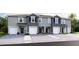 Attractive townhomes feature an attached garage and welcoming entrances, blending style with practical living at 5110 Captain Davis Dr, Wimauma, FL 33598