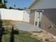 A view of the backyard with a fenced in area, patio area, and sliding glass doors leading inside at 5139 Victoria Ln, Holiday, FL 34690