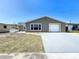 Charming single-story home with a well-maintained lawn, fresh exterior paint, and a one-car garage at 5139 Victoria Ln, Holiday, FL 34690