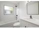 Bathroom features subway tile, shower/tub, modern vanity and fixtures at 5405 S Sellas St, Tampa, FL 33611
