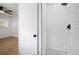 Bathroom featuring tiled shower and view into bedroom at 5405 S Sellas St, Tampa, FL 33611
