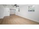 Bedroom featuring hardwood floors, a ceiling fan, and plenty of natural light at 5405 S Sellas St, Tampa, FL 33611