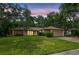 Charming single-story home with well-maintained lawn and stone accents, perfect for suburban living at 56 Bay Woods Dr, Safety Harbor, FL 34695