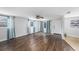 Bright living room features hardwood floors, ceiling fan, and plenty of natural light at 5801 92Nd N Ave, Pinellas Park, FL 33782