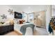 Well-decorated bedroom with accent wall, dresser, and bedside table at 727 Steel Dr, Apollo Beach, FL 33572