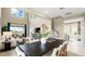 Open-concept living area with high ceilings and views to the backyard at 727 Steel Dr, Apollo Beach, FL 33572