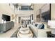 Spacious living room with modern decor open to dining and kitchen areas at 727 Steel Dr, Apollo Beach, FL 33572