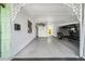 Spacious carport with decorative white trim offers covered parking and secure storage at 7850 40Th N Ave # 7850, St Petersburg, FL 33709