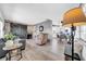 Open-concept living area with hardwood floors, modern decor, and abundant natural light at 7850 40Th N Ave # 7850, St Petersburg, FL 33709