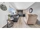 Inviting living area featuring stylish furnishings and a decorative barn door accent wall at 7850 40Th N Ave # 7850, St Petersburg, FL 33709