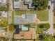 Aerial view of property showcasing backyard, landscaping, and the surrounding neighborhood at 812 60Th S St, Gulfport, FL 33707
