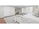 Primary bedroom featuring neutral walls, hardwood floors, and stylish decor at 812 60Th S St, Gulfport, FL 33707
