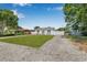 Charming home featuring a well-maintained lawn and front yard with driveway at 812 60Th S St, Gulfport, FL 33707