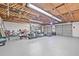 Spacious garage with ample storage space, exposed ceiling beams and multiple doors at 812 60Th S St, Gulfport, FL 33707