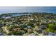 Stunning aerial view showcases the home's location near a beautiful bay and lush greenery at 852 Cordova Ne Blvd, St Petersburg, FL 33704