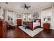 Beautiful bedroom with wood floors, multiple windows, and coordinated decor at 852 Cordova Ne Blvd, St Petersburg, FL 33704