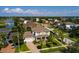 This beautiful home features lush landscaping, an attached two-car garage, and a paver driveway at 852 Cordova Ne Blvd, St Petersburg, FL 33704