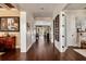 Spacious hallway with hardwood floors connecting various rooms, showcasing the home's open layout at 852 Cordova Ne Blvd, St Petersburg, FL 33704