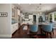 Spacious kitchen with stainless steel appliances, a large island with bar seating, and modern pendant lighting at 852 Cordova Ne Blvd, St Petersburg, FL 33704