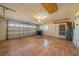 Spacious two car garage with finished flooring and included water heater at 913 El Rancho Dr, Sun City Center, FL 33573