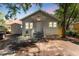 Charming single-story home with a covered entryway, gray exterior, and well-maintained front yard at 918 E 24Th Ave, Tampa, FL 33605