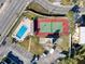 Overhead view featuring the community pool and tennis court at 9201 Tudor Dr # C212, Tampa, FL 33615