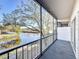 Relax on the screened-in balcony with picturesque waterfront views at 9201 Tudor Dr # C212, Tampa, FL 33615