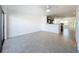Spacious living room features a ceiling fan and tile flooring at 9201 Tudor Dr # C212, Tampa, FL 33615