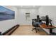 Bright office with modern desk, chair, and two monitors at 9271 Rally Spring Loop, Wesley Chapel, FL 33545