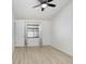 Bright bedroom featuring a ceiling fan, neutral paint, and a window with natural light at 1017 Cameo Crest Ln, Valrico, FL 33596