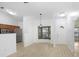 Dining area with new floors, bay window, and easy access to kitchen at 1017 Cameo Crest Ln, Valrico, FL 33596