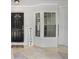 Charming front entrance with decorative stone flooring and a welcoming front door at 1017 Cameo Crest Ln, Valrico, FL 33596
