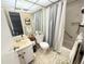 Functional bathroom with shower/tub, toilet, and vanity with mirror at 102 Cambridge Trl # 230, Sun City Center, FL 33573