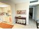 Efficient kitchen design with white cabinets and appliances, ready for your culinary creations at 102 Cambridge Trl # 230, Sun City Center, FL 33573
