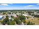 Aerial view showcasing the property's location with a view of the city skyline at 1119 Eau Claire Cir, Tampa, FL 33619