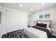 Cozy bedroom with a closet and calming decor at 1119 Eau Claire Cir, Tampa, FL 33619