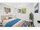 Bright bedroom with ample natural light and stylish decor at 1119 Eau Claire Cir, Tampa, FL 33619