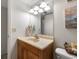 Bathroom featuring neutral paint, tile flooring, and modern fixtures at 11485 Oakhurst Rd # 200-101, Largo, FL 33774
