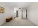Bright bedroom features neutral carpet and paint. Includes access to ensuite bathroom at 11485 Oakhurst Rd # 200-101, Largo, FL 33774