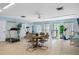 Fitness center featuring exercise equipment, tile flooring, ceiling fan, and light blue walls at 11485 Oakhurst Rd # 200-101, Largo, FL 33774
