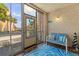 Cozy, well-lit lanai with inviting seating, offering a relaxing outdoor experience at 11485 Oakhurst Rd # 200-101, Largo, FL 33774