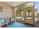 Enclosed lanai with seating area at 11485 Oakhurst Rd # 200-101, Largo, FL 33774
