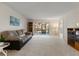 Inviting living room provides access to the lanai at 11485 Oakhurst Rd # 200-101, Largo, FL 33774