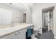 Neutral bathroom with a white vanity, sink, toilet, and modern fixtures at 11845 Autumn Creek Dr, Riverview, FL 33569