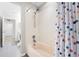 Bathroom featuring a tub, shower with a colorful polka-dot curtain at 11845 Autumn Creek Dr, Riverview, FL 33569