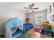 bedroom with a play tent, twin bed, and organized toys and decor at 11845 Autumn Creek Dr, Riverview, FL 33569
