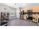Spacious kitchen with stainless steel appliances and light wood cabinetry at 11845 Autumn Creek Dr, Riverview, FL 33569